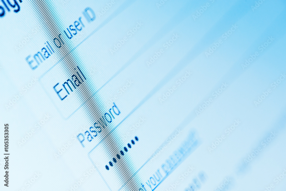 Login with email and password on computer screen Login with email and password on computer screen