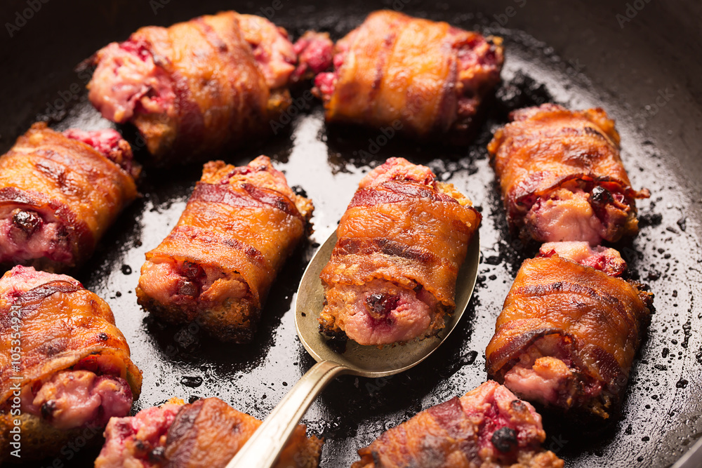 Rich snack of bacon and bread stuffed with cheese Rich snack of bacon and bread stuffed with cheese