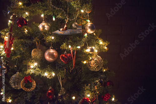 Christmas decorations, A traditional real Christmas tree, decorated with lights,  photo