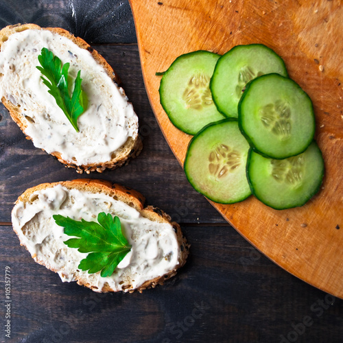 Slices of fresh cucumber and sandwiches