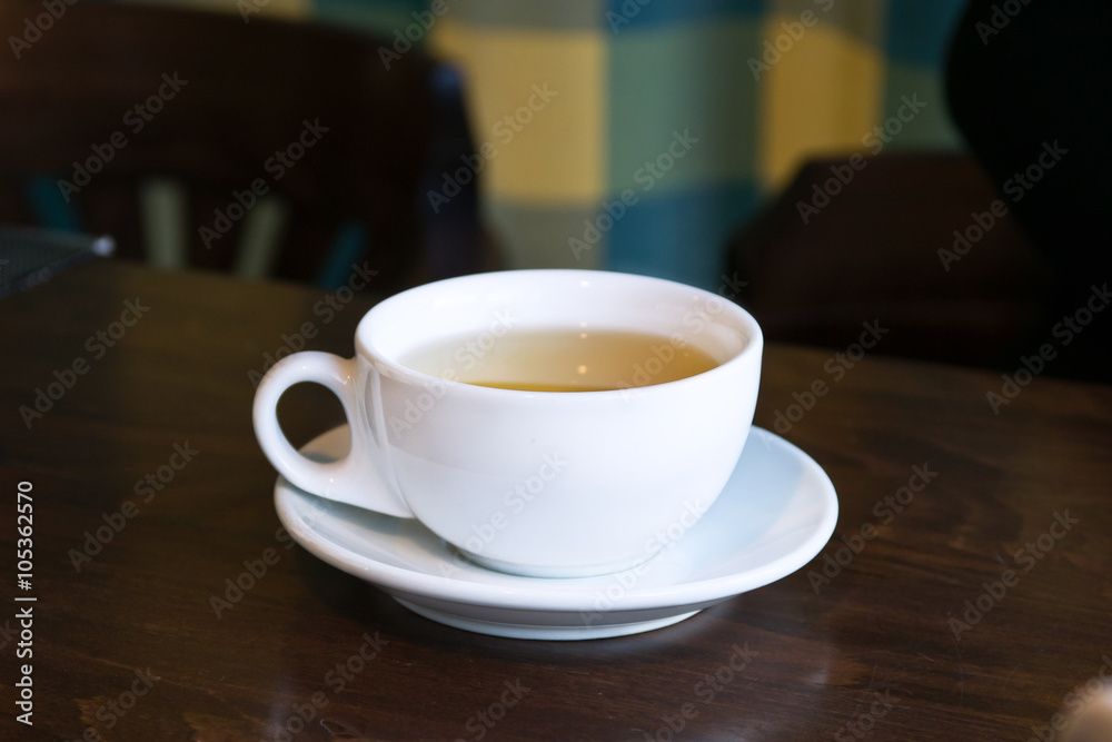 Breakfast tea in a cafe.Cup on a table Breakfast tea in a cafe.Cup on a table
