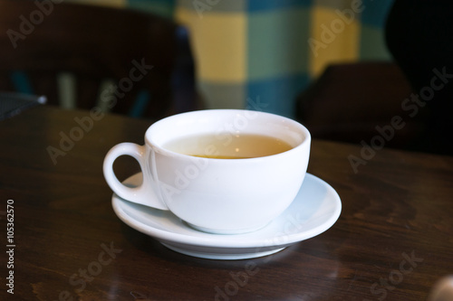 Breakfast tea in a cafe.Cup on a table