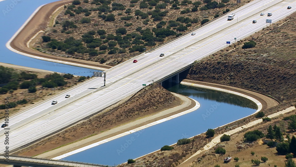 Aerial shot of aqueduct and freeway