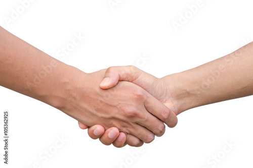 Closeup of two businessmen, lawyers or politicians shaking hands to celebrate a successful agreement with one of them holding the other hand in his pocket. Isolated over white background.