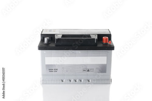 automobile battery isolated on white background with reflection