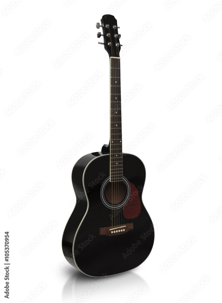Black acoustic guitar is isolated on the white background