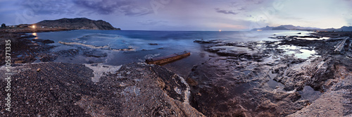 Night marine panorama. Spring evening on the coast of black sea.