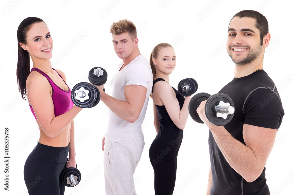 happy men and women in sportswear doing exercises with dumbbells happy men and women in sportswear doing exercises with dumbbells