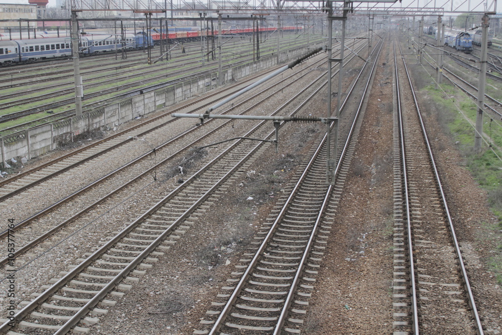 Bucharest, Romania, March 13, 2016: Passenger trains are seen the switch yard of Gara de Nord main railway station.