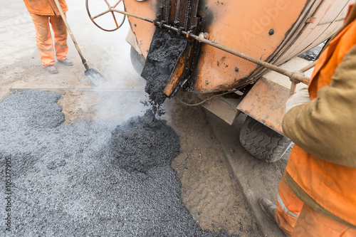 From construction emergency vehicles poured asphalt, road repair