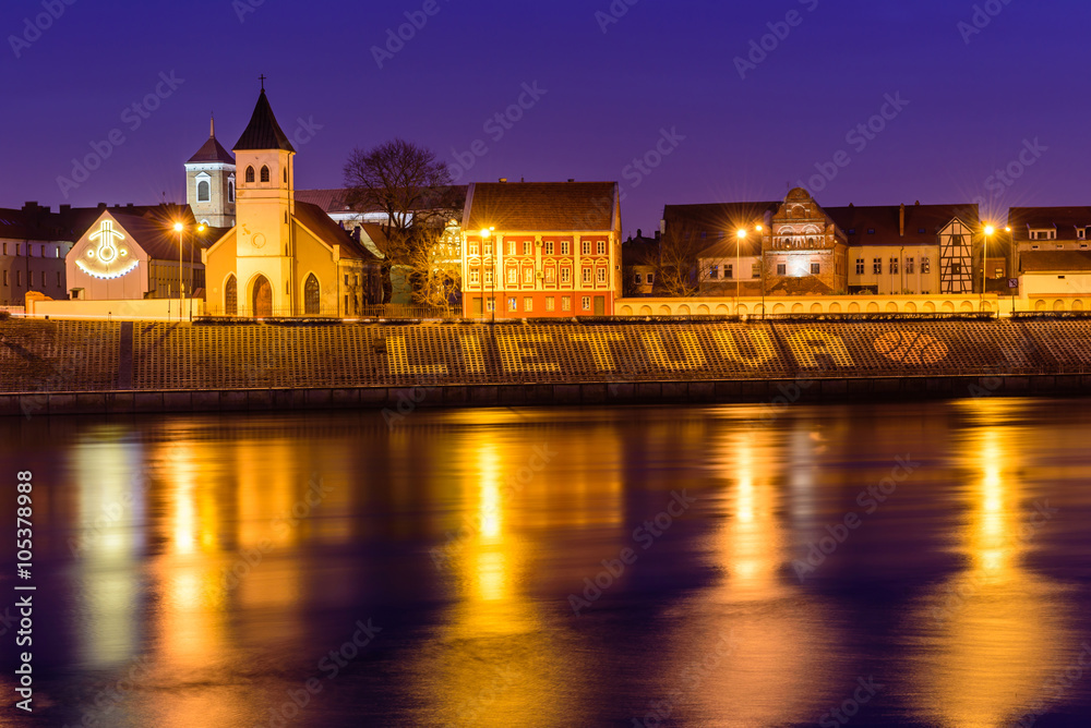 Night panorama of the river and Kaunas, Lithuania.