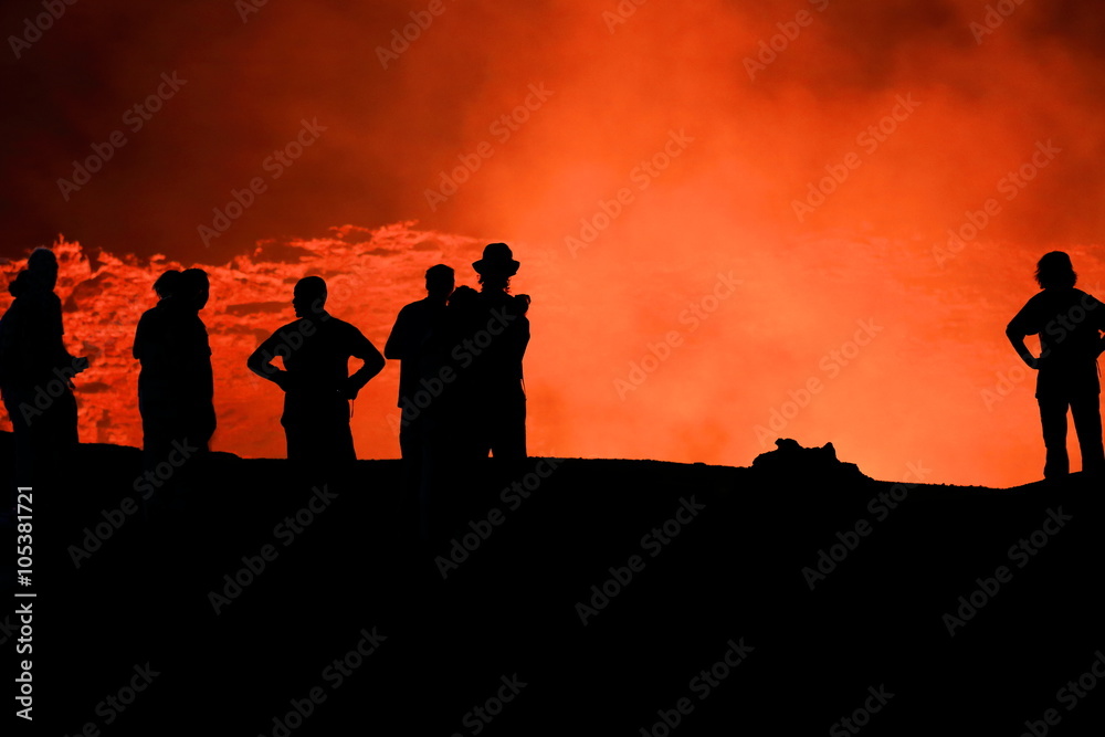 Tourist silhouettes-burning lava lake. Erta Ale volcano-Danakil-Ethiopia. 0227