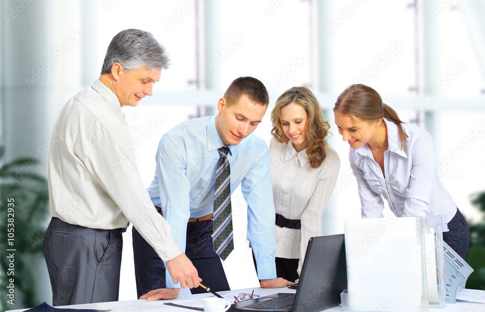 business and office concept - business team having meeting in office business and office concept - business team having meeting in office