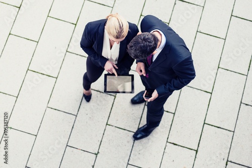 Business man and woman in top view