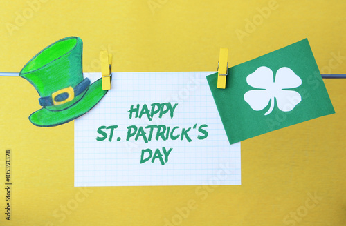 happy St Patrick's Day card, March 17, with Leprechaun hat and pot of gold, on pegs ( clothespin )
