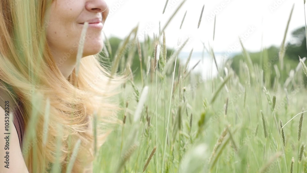 Beautiful Caucasian blonde woman playing in the field with grass 1080p slow motion HD footage - Blond female outdoor relaxing in the field slow-mo 1920X1080 FullHD video Beautiful Caucasian blonde woman playing in the field with grass 1080p slow motion HD footage - Blond female outdoor relaxing in the field slow-mo 1920X1080 FullHD video