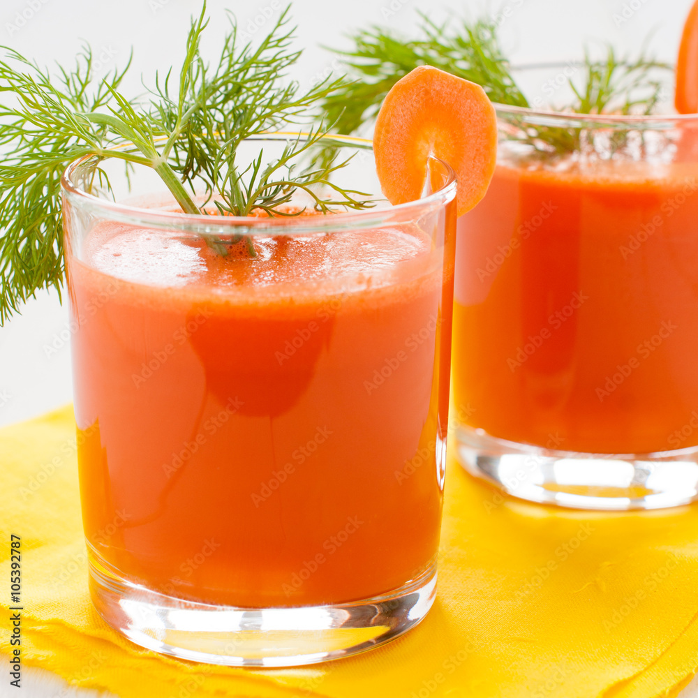 Carrot juice in glasses, closeup Carrot juice in glasses, closeup