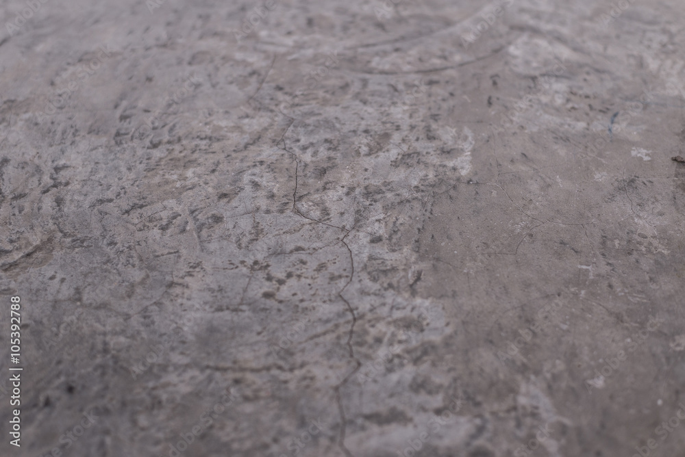 Cement Floor with texture and detailed on the surface plus cracking. The grey tone is from the coating on the floor. Cement Floor with texture and detailed on the surface plus cracking. The grey tone is from the coating on the floor.
