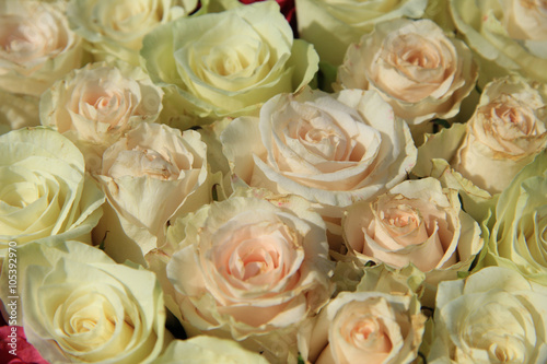 Roses in different shades of pink  bridal arrangement