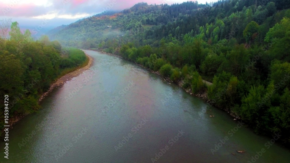 Aerial view of the mountain river in Carpathians on sunrise Aerial view of the mountain river in Carpathians on sunrise