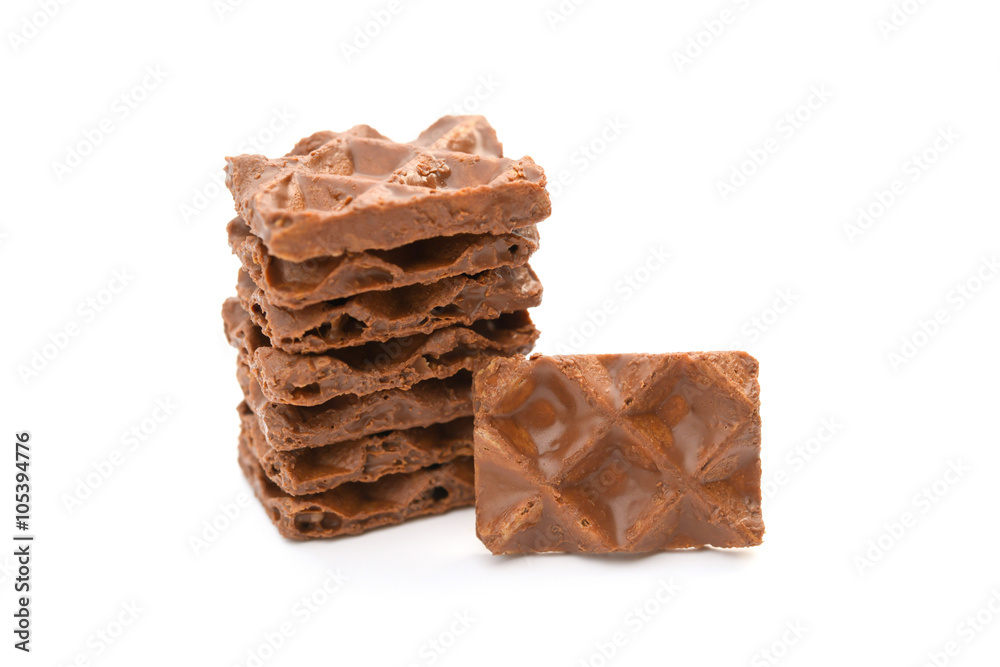 chocolate blocks stack up on a white background chocolate blocks stack up on a white background