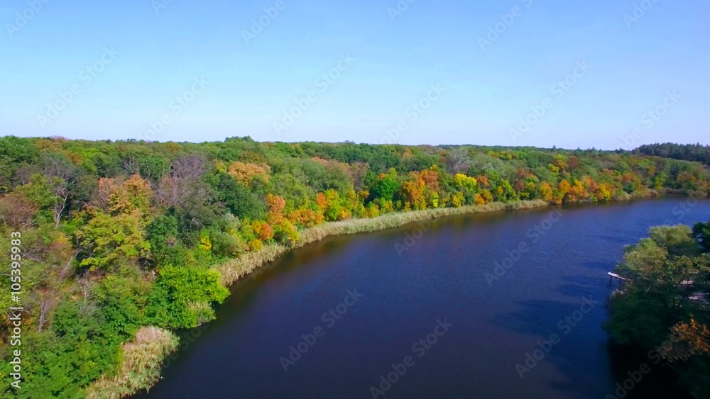 Aerial view of the river in autumn forest Aerial view of the river in autumn forest