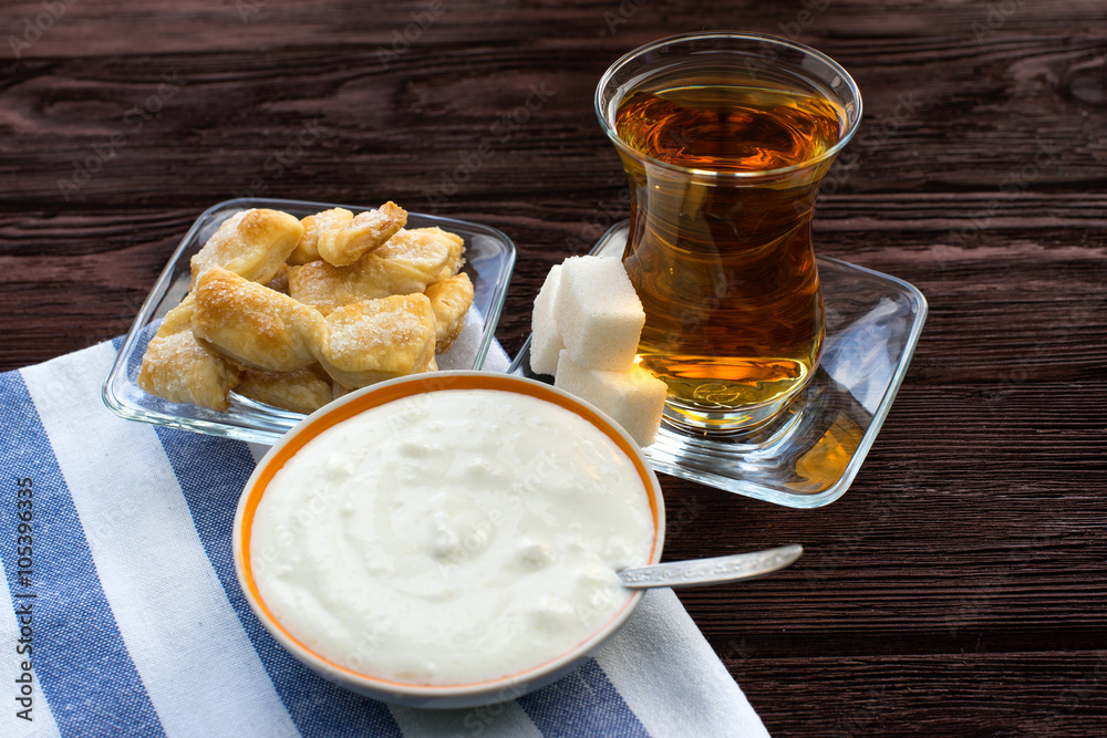 Tea biscuits and cheese on a wooden table Tea biscuits and cheese on a wooden table