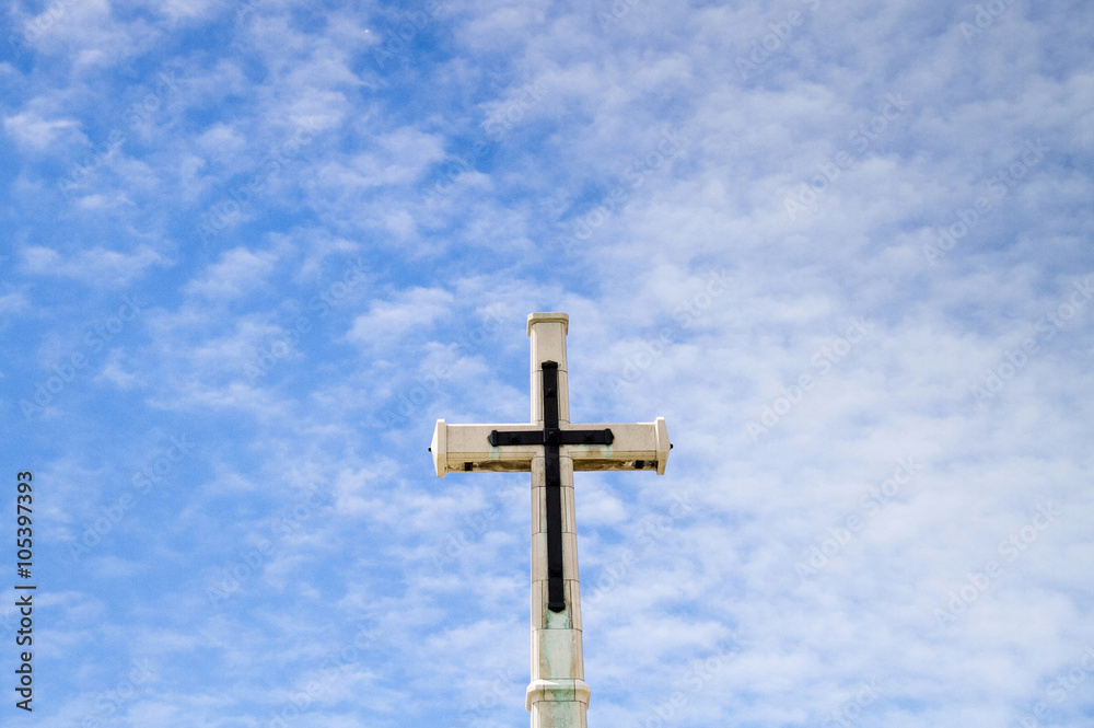 Cross on blue sky background