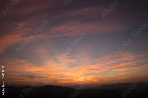 Colorful sunset on top of thailand mountain