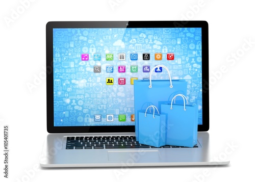 laptop and shopping pags on white background