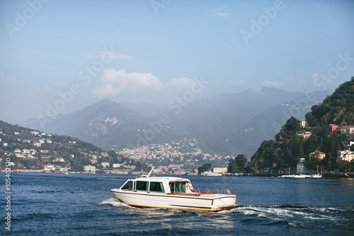 boat in a mountain lake Como