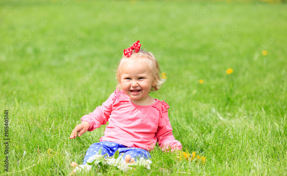 cute happy little girl with flowers in spring cute happy little girl with flowers in spring