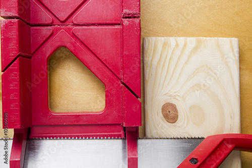 Cutting boards using the miter box and saw. photo