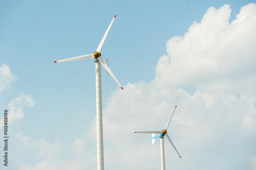 Close up of wind turbines ,blue sky background Close up of wind turbines ,blue sky background