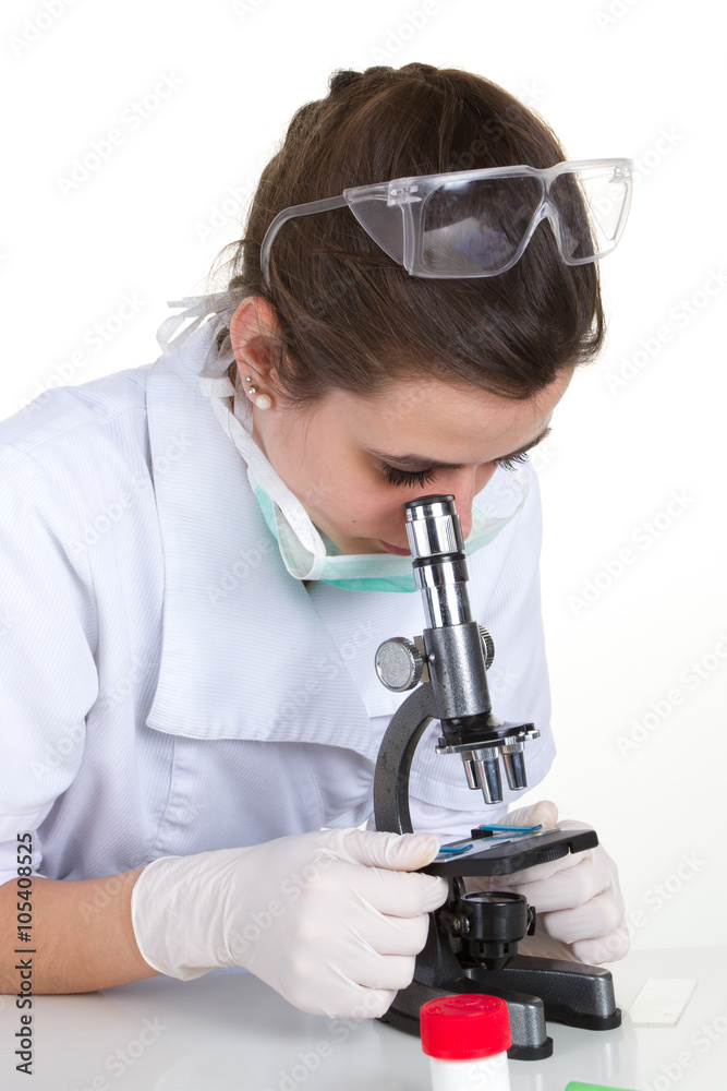 Scientist using a microscope in a laboratory isolated on white Scientist using a microscope in a laboratory isolated on white