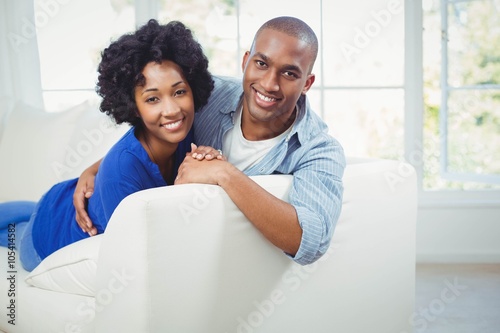 Portrait of smiling couple on the sofa
