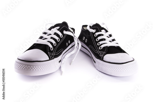 brand new black and white tennis shoes isolated on white background
