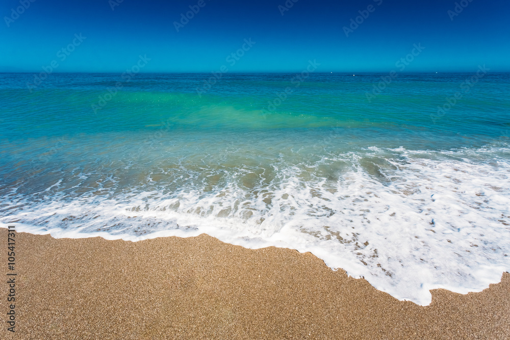 Soft Sea Ocean Waves Wash Over Golden Sand Background. Sand beac