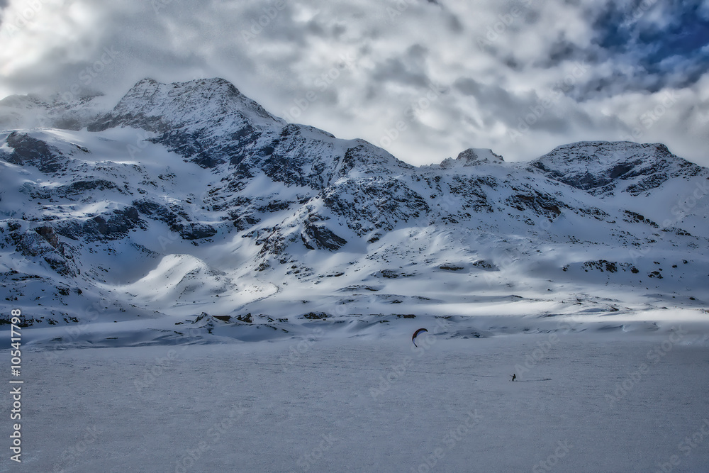 Winter landscape with  ski kiting