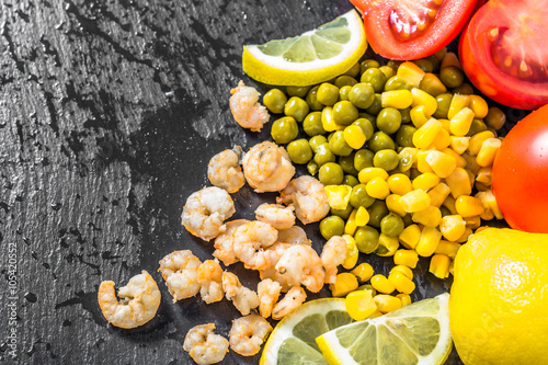 Colorful vegetable and fruit background with shrimps