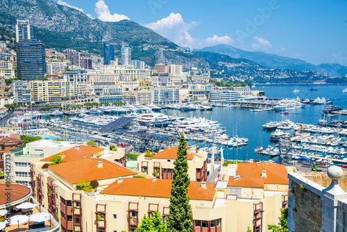 Monaco Montecarlo principality aerial view cityscape. Skyscrapers, mountains and marina. Azure coast. France, Europe.