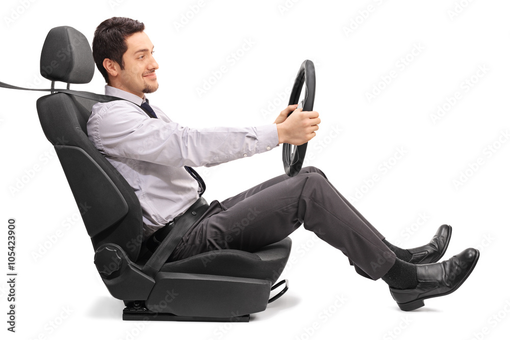 Man driving seated on a car seat Man driving seated on a car seat