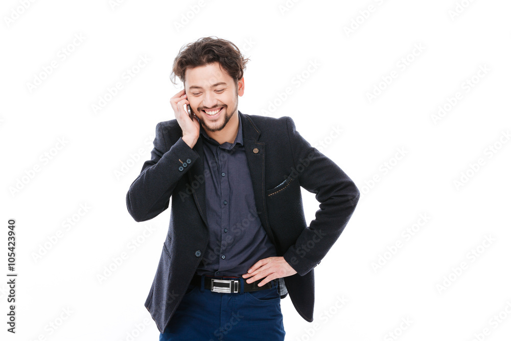 Laughing businessman talking on the phone