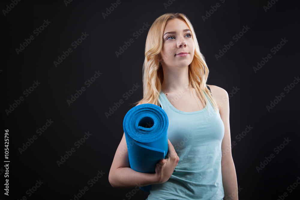 Girl stand whit the mat Girl stand whit the mat