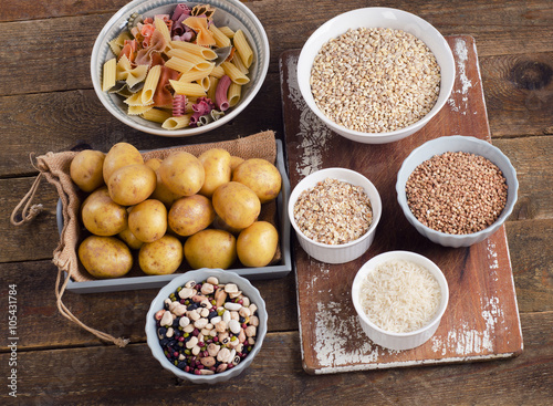 Healthy Food: Best Sources of Carbs on rustic wooden background.