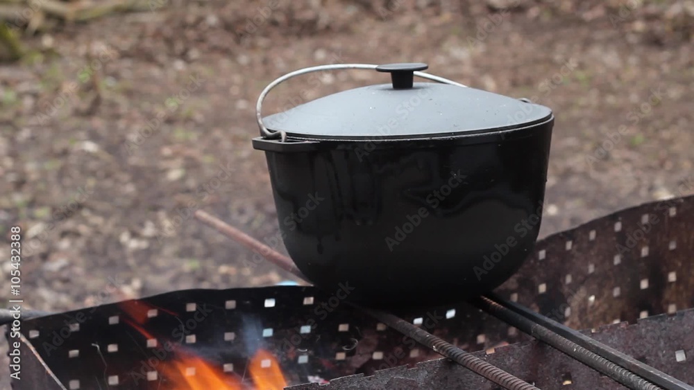 Cooking Food in the Forest on Fire. Tourist Camping. Cooking Food in the Forest on Fire. Tourist Camping.