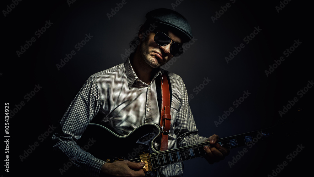 Jazz Musician Playing a Guitar Jazz Musician Playing a Guitar
