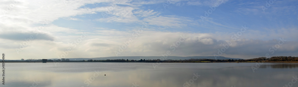 Arlington Reservoir east Sussex on a Still day. panorama across the water