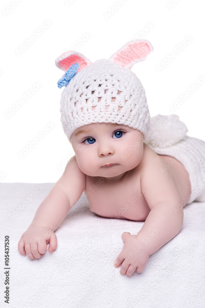 cute baby child in rabbit costume lying down on white cute baby child in rabbit costume lying down on white