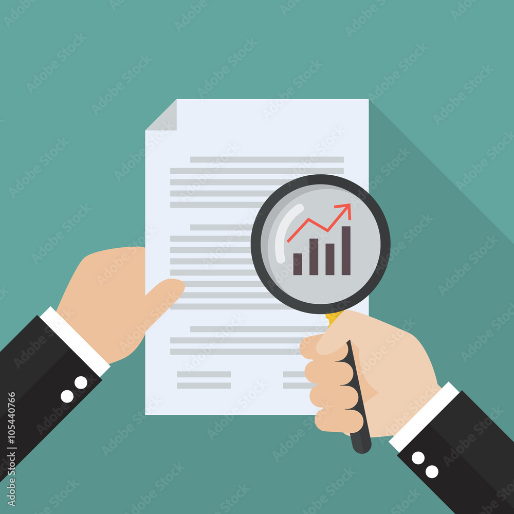Hand holding magnifying glass with document paper Hand holding magnifying glass with document paper
